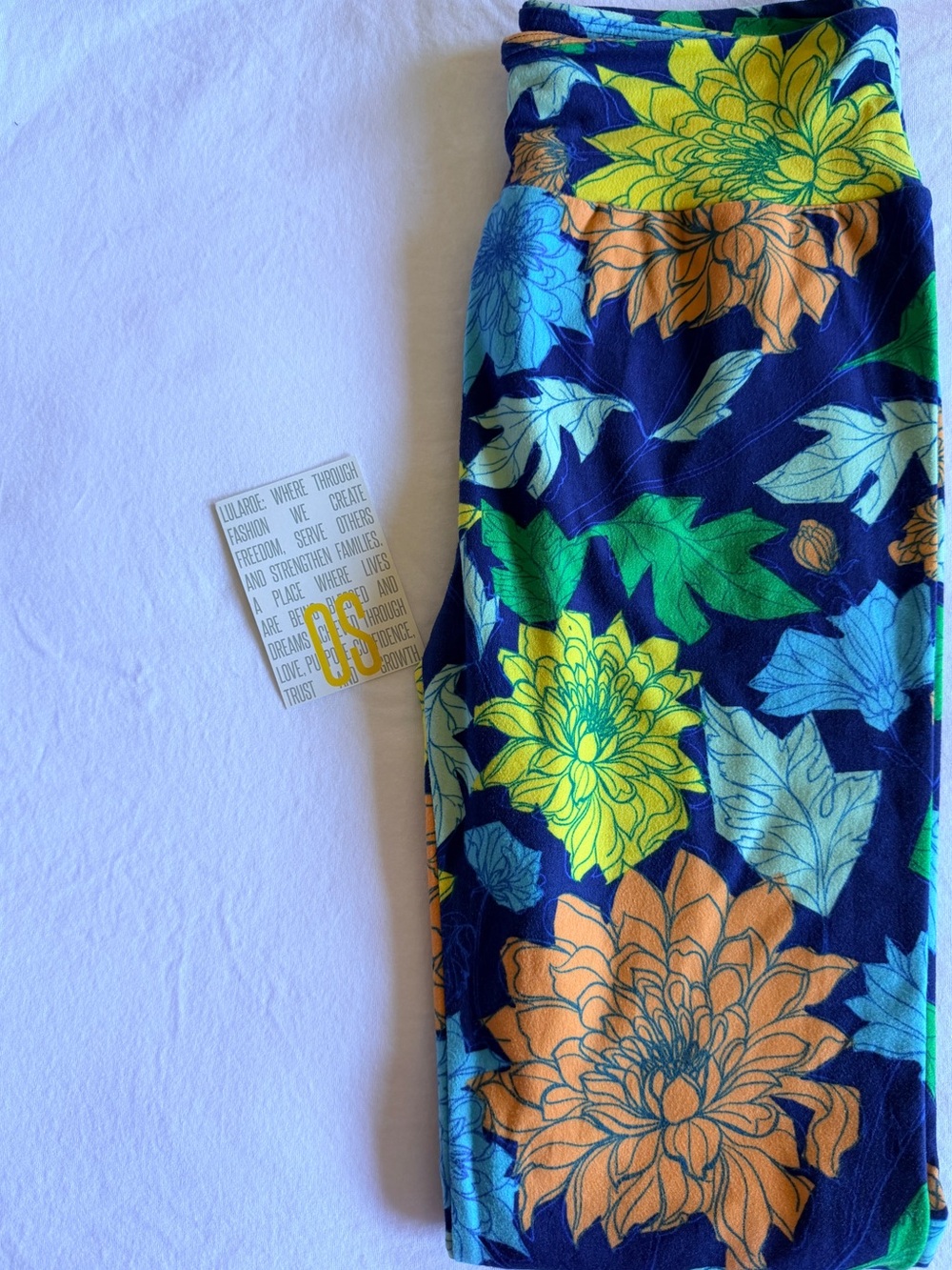 LuLaRoe Navy Leggings with Green, Yellow & Orange Floral Print
